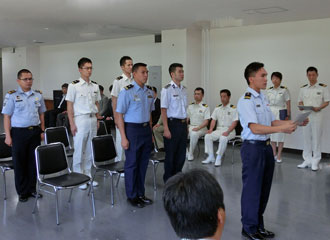 The participant from Malaysia making a pledge