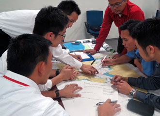 Participants discussing response plan